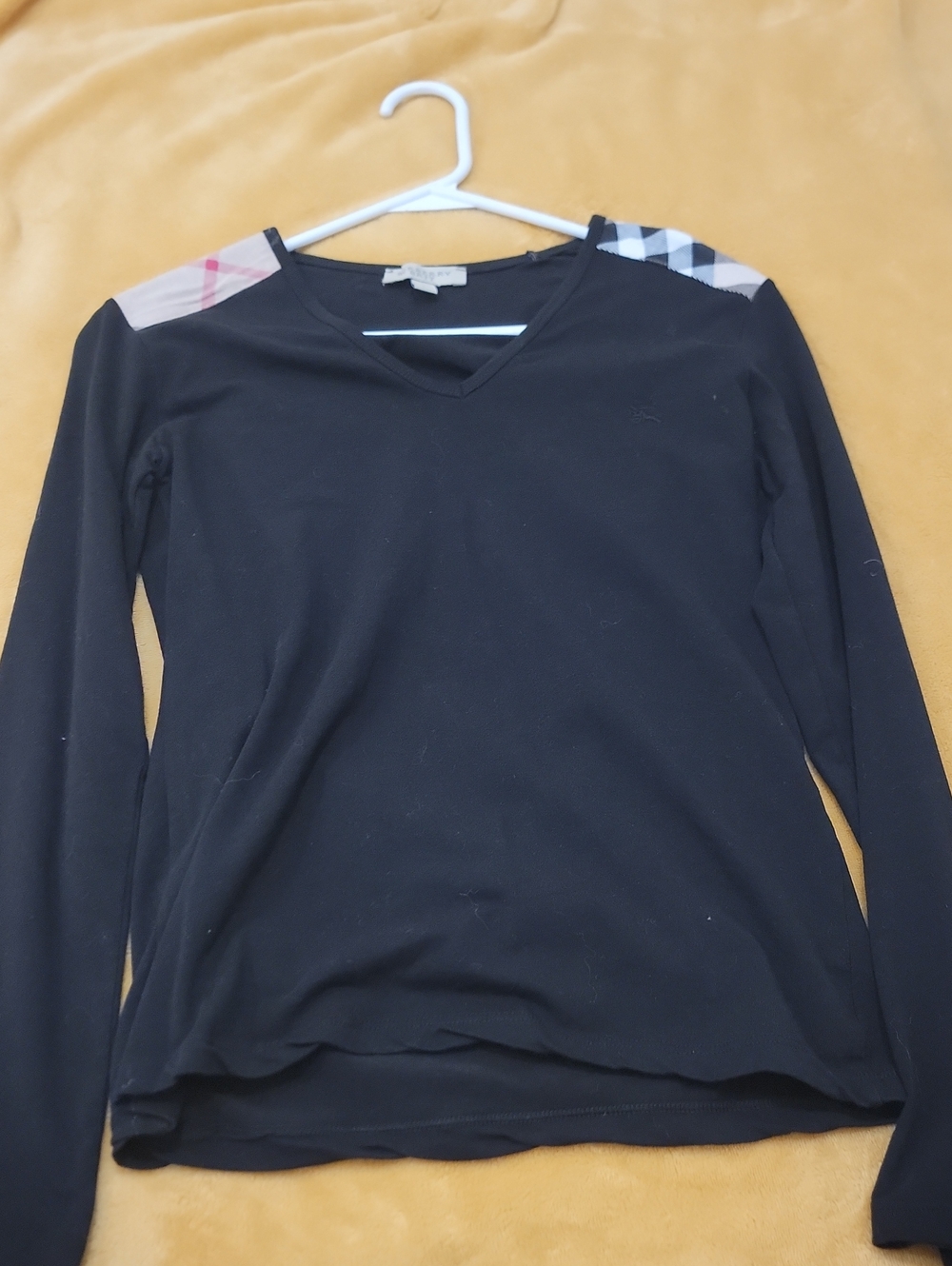 Burberry Black Long-Sleeve V-Neck Top with Signature Plaid Shoulder Panels